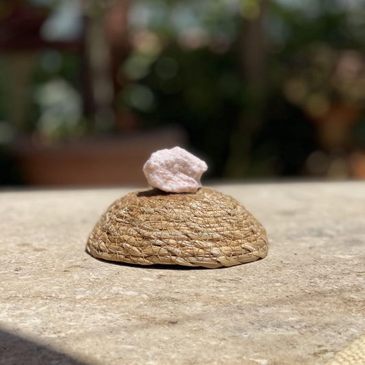 Raw Pink Opal peace stone in a protective glass dome for calm energy and emotional healing.