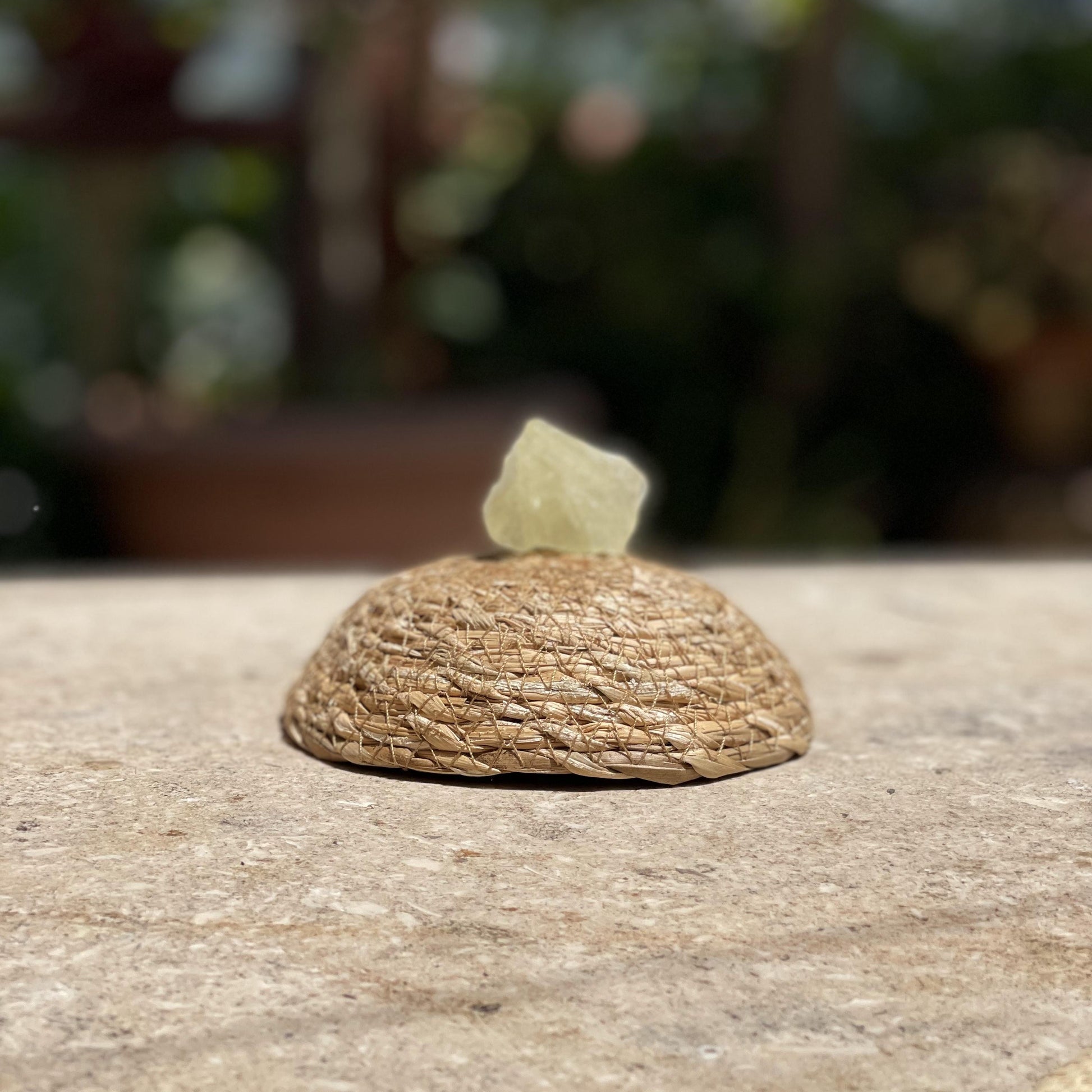 Raw Yellow Calcite sunshine stone in a protective glass dome for confidence, joy, and happy energy.